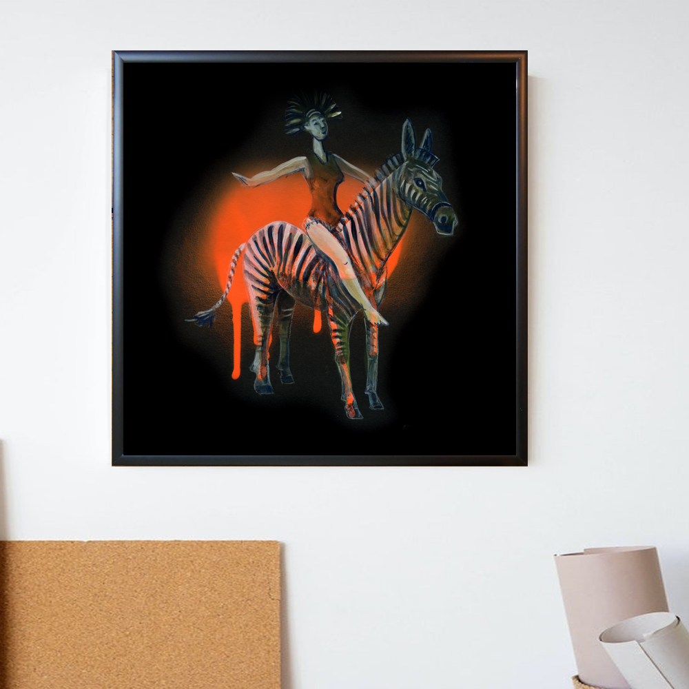 A woman sitting on a zebra